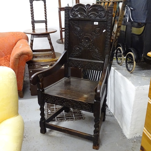 2007 - An Antique oak Wainscot chair, with a carved acanthus leaf panelled back