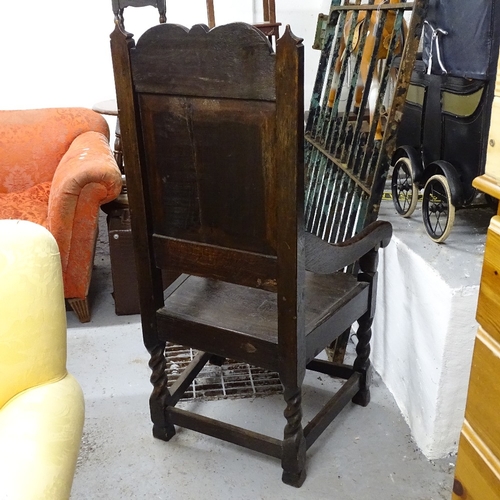 2007 - An Antique oak Wainscot chair, with a carved acanthus leaf panelled back