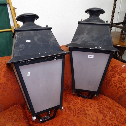 2014 - A pair of black painted metal lanterns with perspex panels, H75cm