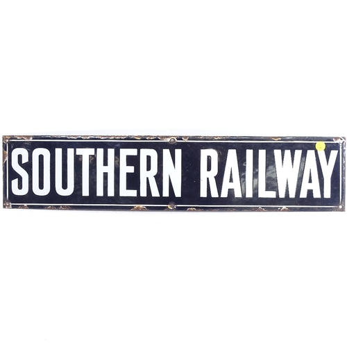 150 - A vintage black and white enamel Southern Railway sign, length 68cm