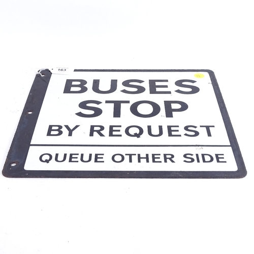 163 - A black and white double-sided enamel sign 