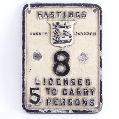 167 - A Hastings county borough licenced Taxi sign, no.8, width 11cm, height 15cm