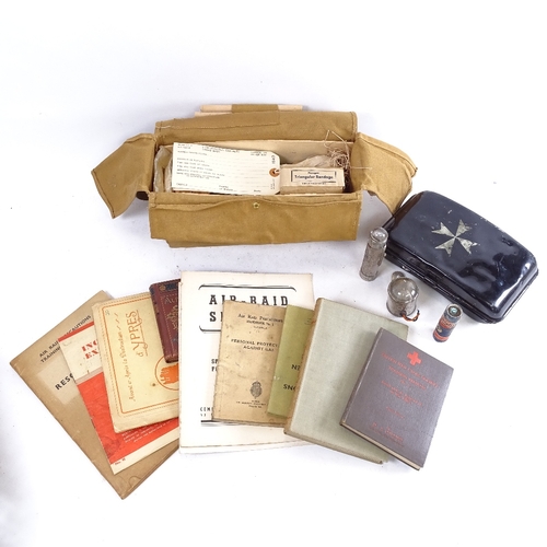 174 - A Parragon first aid A.R.P case and contents, red cross book etc.