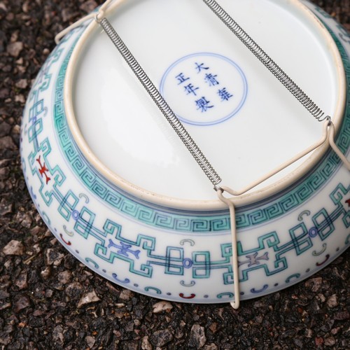 367 - A Chinese porcelain bowl, with painted decoration and 6 character mark, diameter 21cm, and a floral ... 