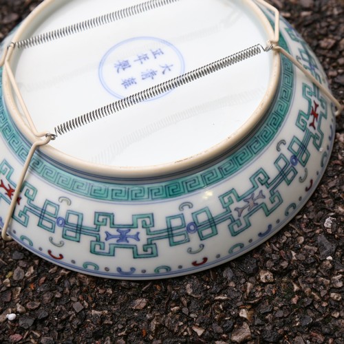 367 - A Chinese porcelain bowl, with painted decoration and 6 character mark, diameter 21cm, and a floral ... 