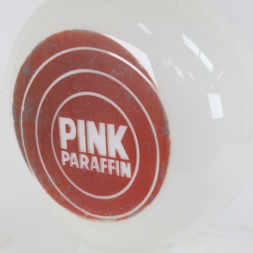 23 - A Vintage Pink Paraffin opaque white glass advertising petrol pump globe lamp, height 40cm, diameter... 