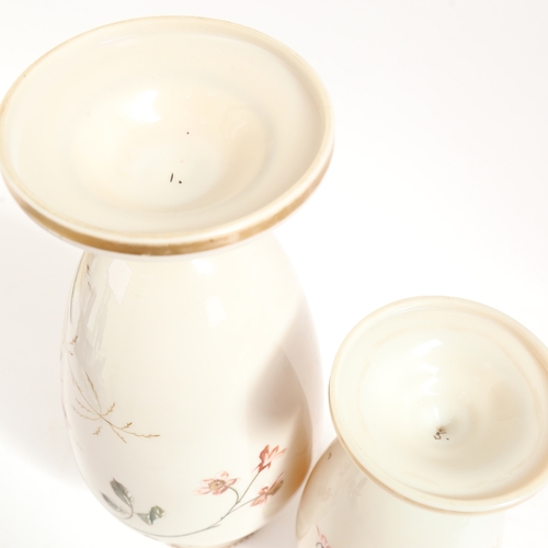 47 - A graduated pair of Victorian milk glass vases, hand painted and gilded bird and floral decoration, ... 