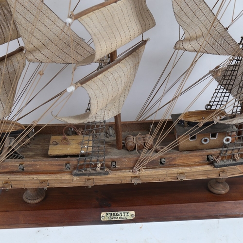 59 - A handmade model frigate warship, with 18lb  guns, on wood stand, overall length 82cm, overall heigh... 