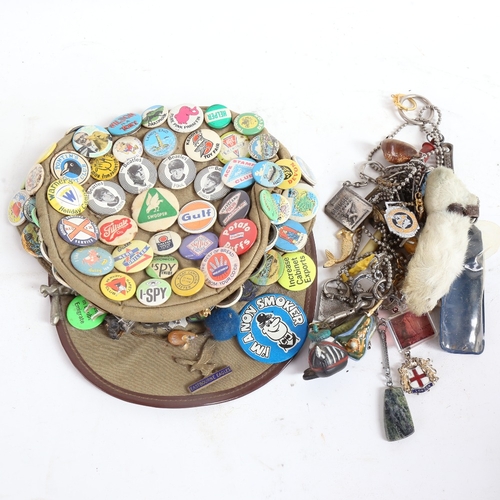 62 - A Vintage cap with various badges, including advertising, The Beatles, and a key chain