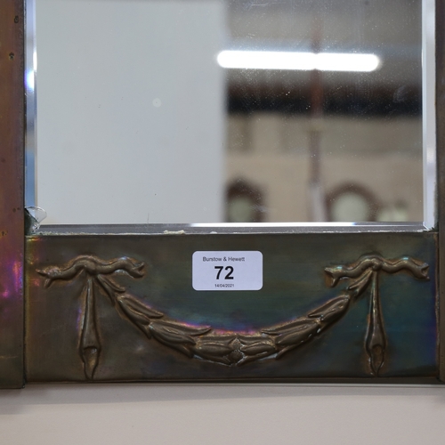 72 - An Art Nouveau brass-framed rectangular bevel-edge wall mirror, with shaped frame and embossed swag ... 