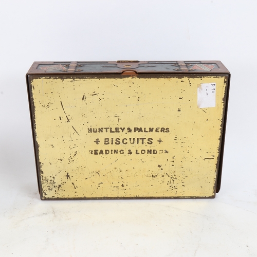 88 - A Vintage Huntley & Palmers novelty lithographed tin travelling trunk design biscuit tin, 21cm x 16c... 