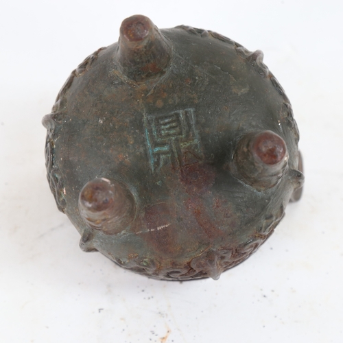 91 - A Chinese cast-iron Archaic style Ding tripod censer, Archaic character mark on base, height 15cm, d... 