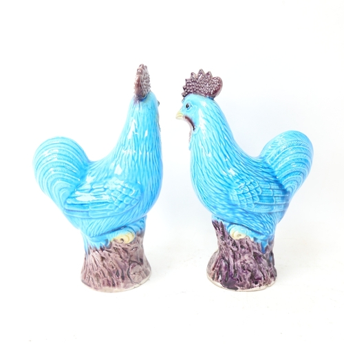 266 - A pair of Chinese turquoise glaze pottery cockerel figures, height 20cm