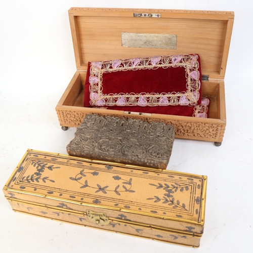 303 - An Indian carved sandalwood glove box, an Antique carved hardwood printer's block etc, box width 30c... 