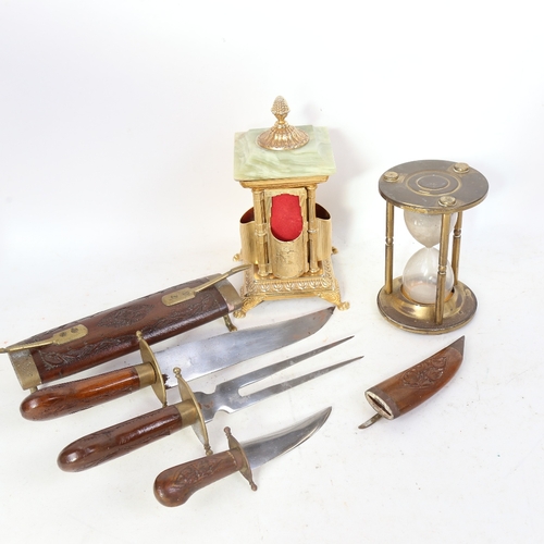 326 - 2 Indian hardwood-handled and sheathed knives, an Italian novelty onyx cigarette dispenser etc (4)