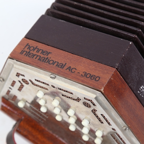 344 - A Vintage Hohner aluminium-bound concertina