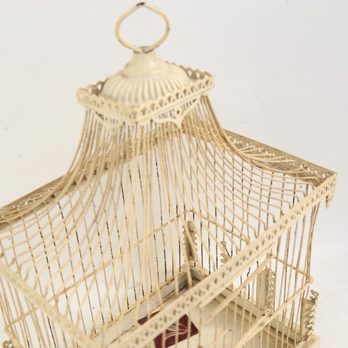 357 - A Vintage cream painted wirework bird cage, W30cm, H43cm, D21cm