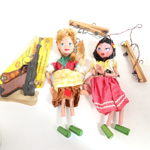 373 - 2 Pelham Puppets, including Gypsy and Gretal, and a Luger automatic repeater cap firing pistol (3)