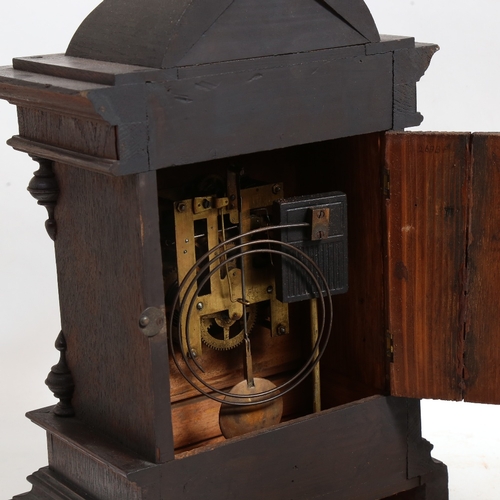 376 - An oak-cased 8-day mantel clock by Junghans, with gong and pendulum, height 50cm