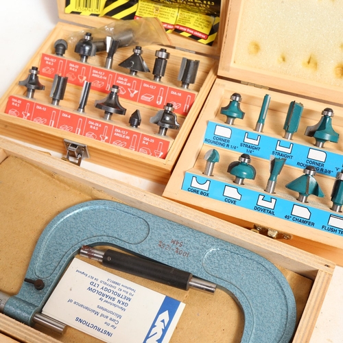 383 - 2 cased 12-piece router bit sets, and a micrometer (3)