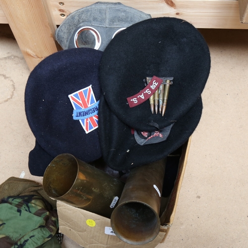 406 - Various military items, including gas masks, cannon shell trench art vases etc (boxful)