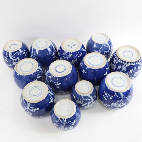 429 - A large group of Chinese blue and white Prunus pattern ginger jars, 1 example with 4 character mark,... 