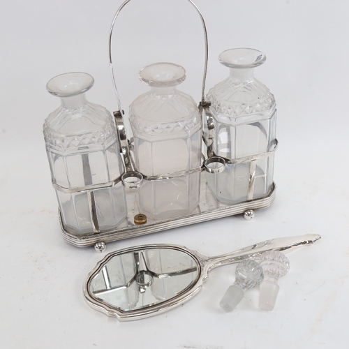 433 - A silver plated 3-bottle decanter stand with bottles, and a Art Deco style silver-backed dressing ta... 