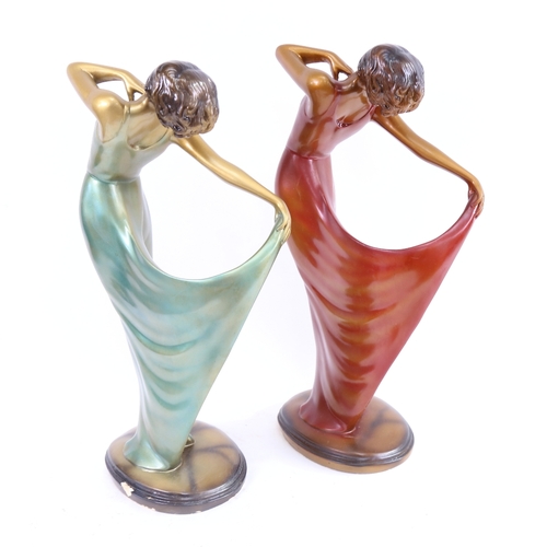 440 - A pair of Art Deco style resin dancer sculptures, height 39cm