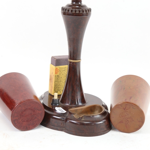 441 - An early 20th century Bakelite smoker's companion table lamp, with matchbox holder and ashtray, and ... 