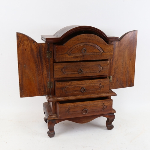 481 - A mahogany table-top dome-top collector's cabinet of drawers, W29cm, H44cm, D15cm