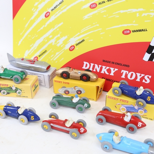 493 - A set of Dinky Toys model racing cars (repainted), some in reprinted boxes, and a Dinky Toys adverti... 