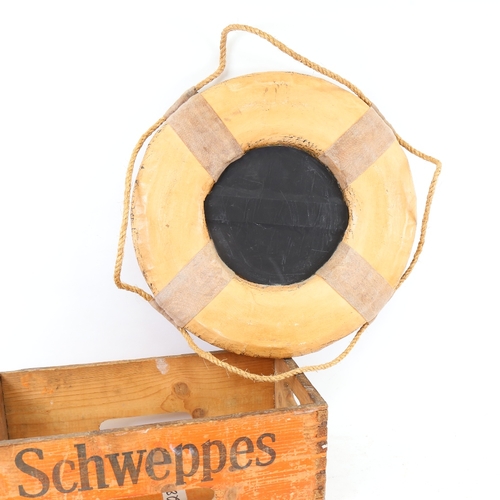 495 - A Vintage stained pine Schweppes bottle box, and a novelty Titanic life ring mirror, diameter 45cm (... 