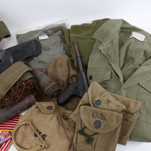 510 - Various American military clothing, including jackets, canvas water bottle holders, utility belts, g... 