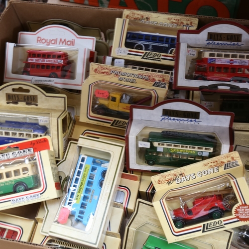 513 - A quantity of various Vintage boxed transport buses and vehicles, including Days Gone, Royal Mail an... 