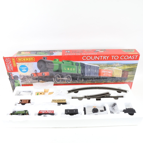 527 - A boxed Hornby Country to Coast 00 gauge train set