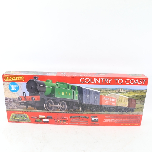 528 - A boxed Hornby Country to Coast 00 gauge train set