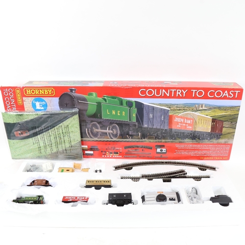 528 - A boxed Hornby Country to Coast 00 gauge train set