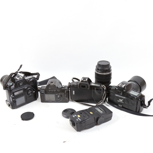 562 - Various Vintage cameras and lenses, including Nikon F70, Canon EOS 650 etc