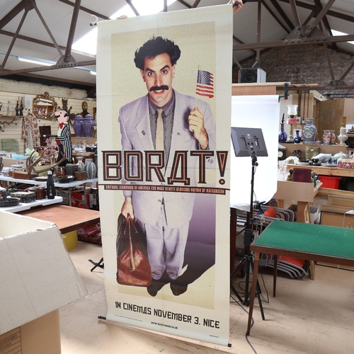 565 - A large Borat Movie advertising poster, 210cm x 92cm