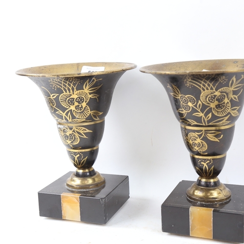 569 - A pair of Art Deco style vase garnitures on marble bases, and a pair of turned wood and brass-mounte... 