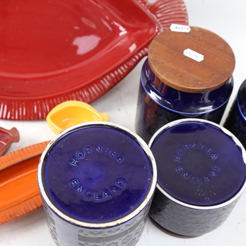 570 - A set of 4 blue glazed Hornsea kitchen storage jars, and a set of fish design pottery dishes (8)