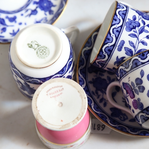 573 - An Aynsley pink and gilded porcelain tea and eggcup, and another Royal Doulton blue and white servic... 