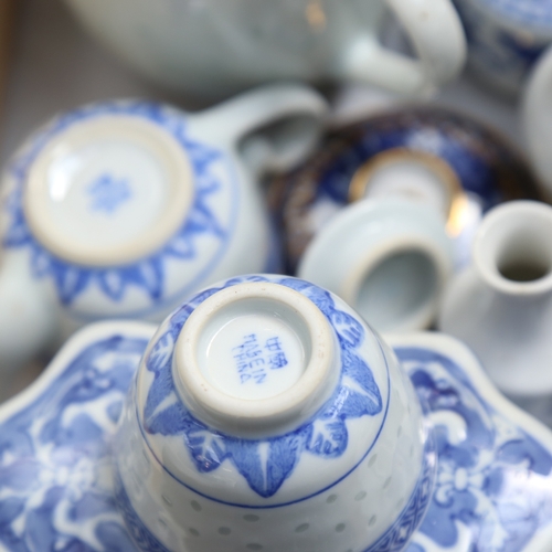 584 - A large quantity of various Chinese blue and white ceramics,  including square-section vase and stan... 