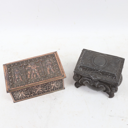 615 - A Japanese silver plate on copper cherub box, and another Antique lead example, width 13cm (2)