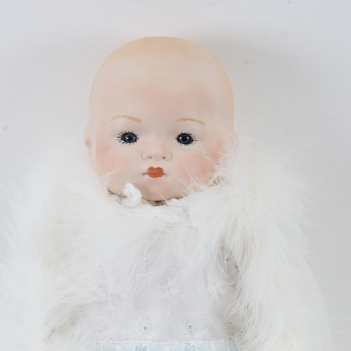 616 - An Armand Marseille toy baby doll, with porcelain limbs, marked 341/4k, signed JE