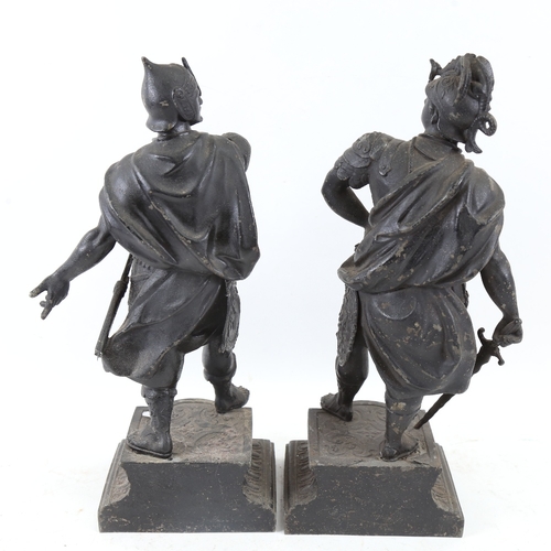 622 - A pair of black painted spelter figural sculptures, knights in armour, height 38cm