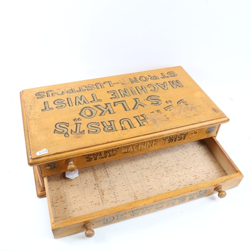 625 - A Vintage Sylko Machine Twist haberdashery shop advertising bank of drawers, W52cm, H14cm, D28cm