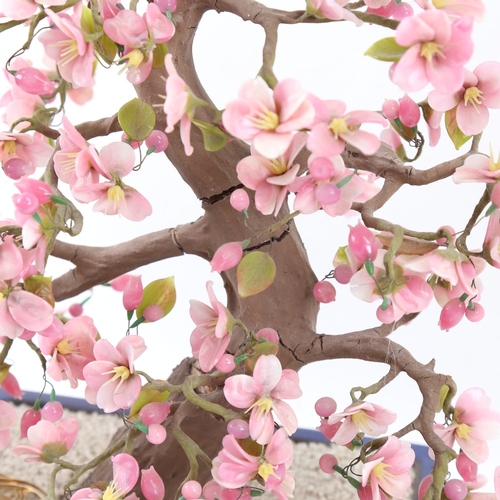 626 - A large scale macket tree in jardiniere, with pink glass petals, height 46cm