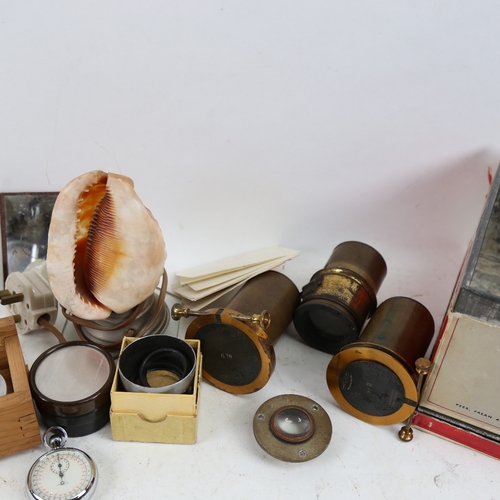 696 - Various scientific instrument lenses, carved shell lamp, Crested Ware etc (boxful)