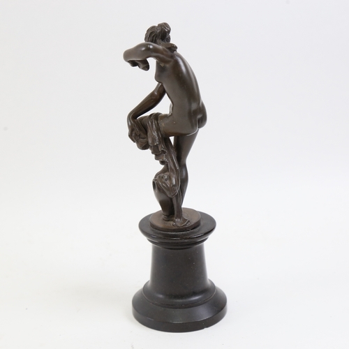 805 - A small patinated bronze nude sculpture, lady washing, marks on base, overall height 21cm